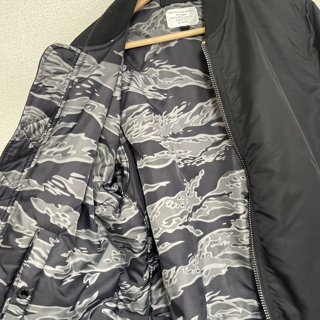 ジャケット・アウター UNDEFEATED X ALPHA INDUSTRIES MA-1