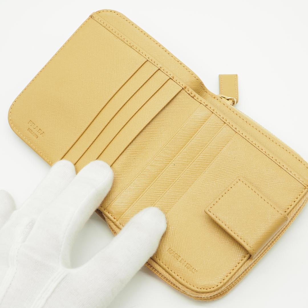 【美品】PRADA プラダ 二つ折り財布 サフィアーノ ラウンドファスナー