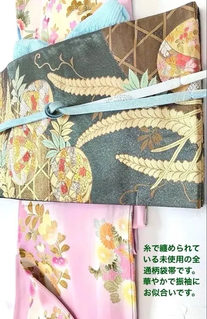未使用美品 振袖 チャーミングなパステル澄んだ桃色 花丸文様 牡丹 橘 青い鳥