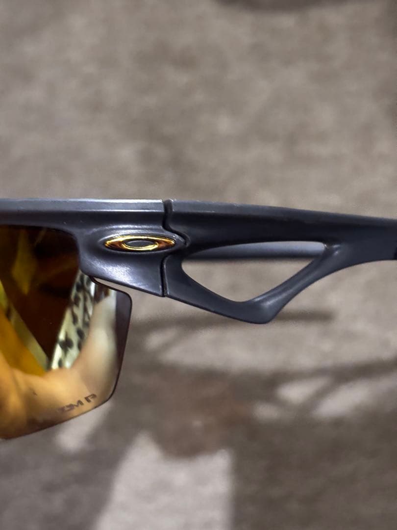 Oakley Sphaera™ ゴールドレンズ サングラス