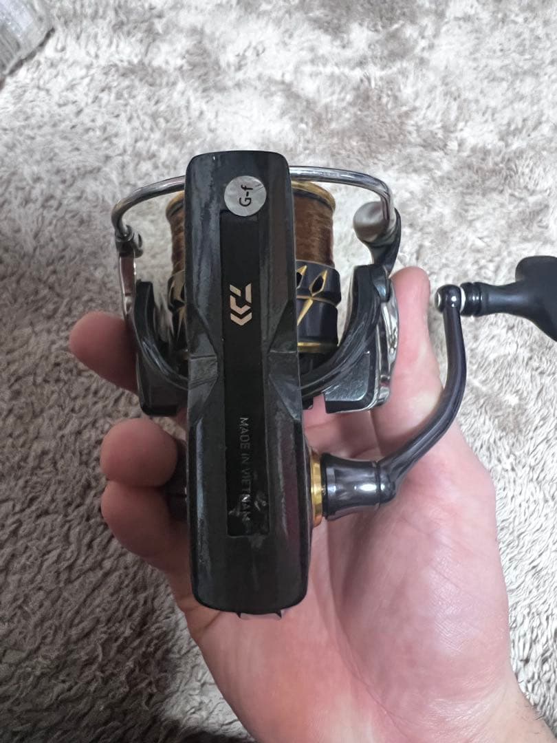 Daiwa スピニングリール 黒・金 カルディア3000XH