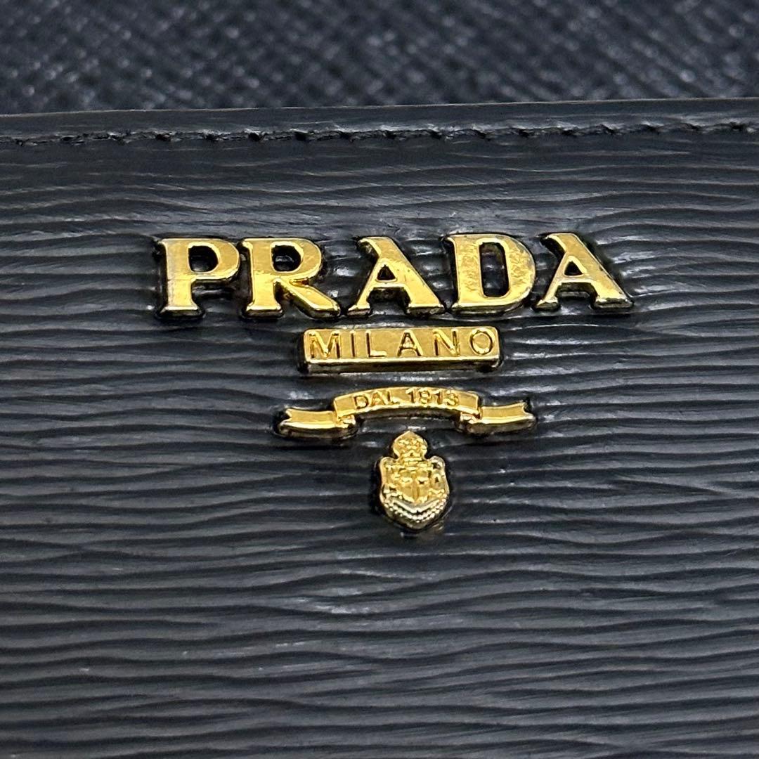 PRADA プラダ　折り財布　ラウンドジップ　ネイビー　ゴールドロゴ