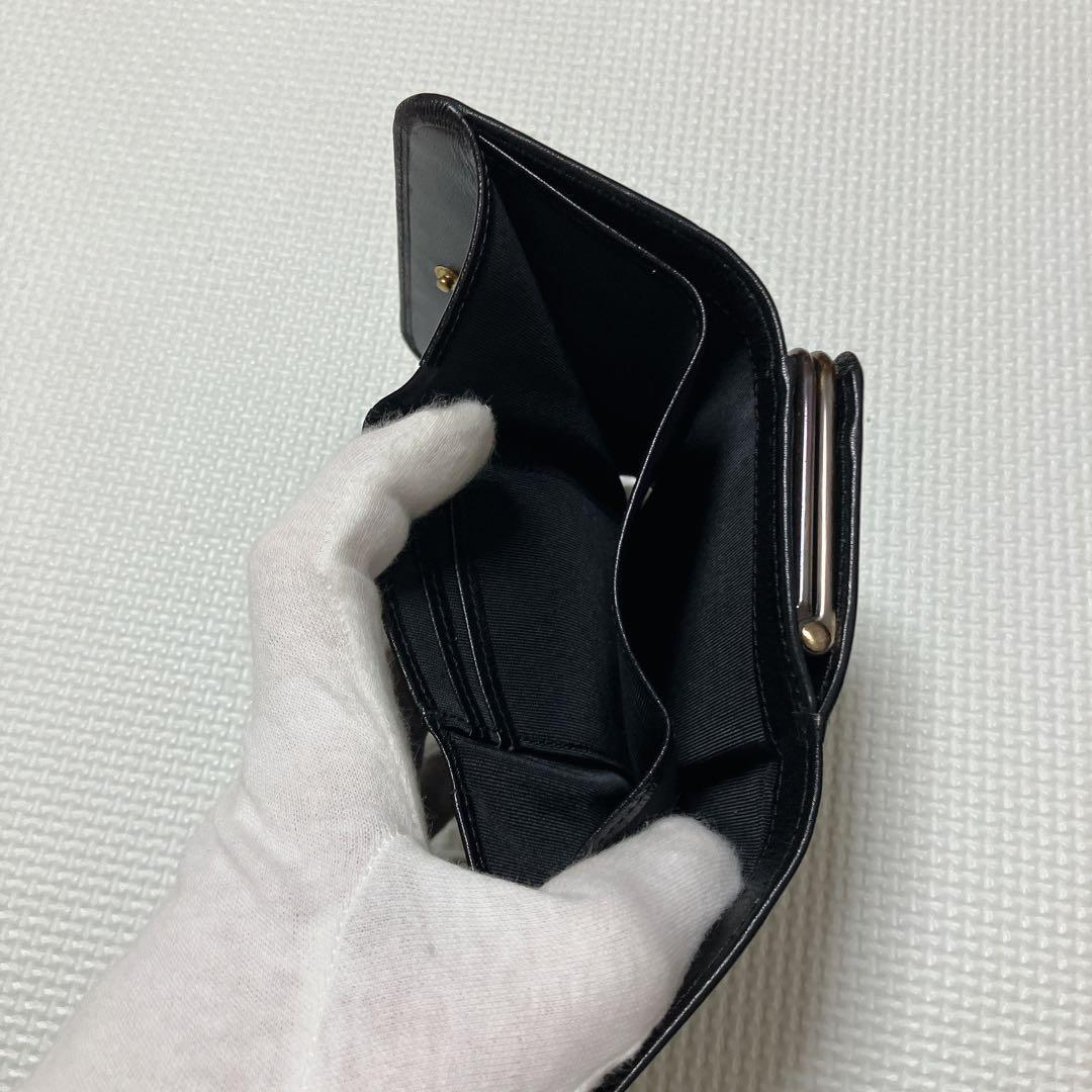 未使用　ANNA SUIアナスイ　エンボス レザーがま口二つ折り財布　ローズ　黒