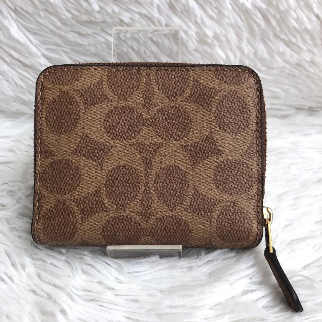 財布 二つ折り COACH コーチ レキシー シグネチャー 本革 レザー 恐竜