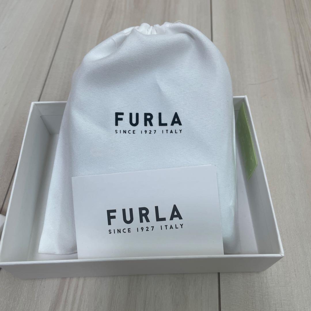 FURLA 二つ折り財布 ライトブルー