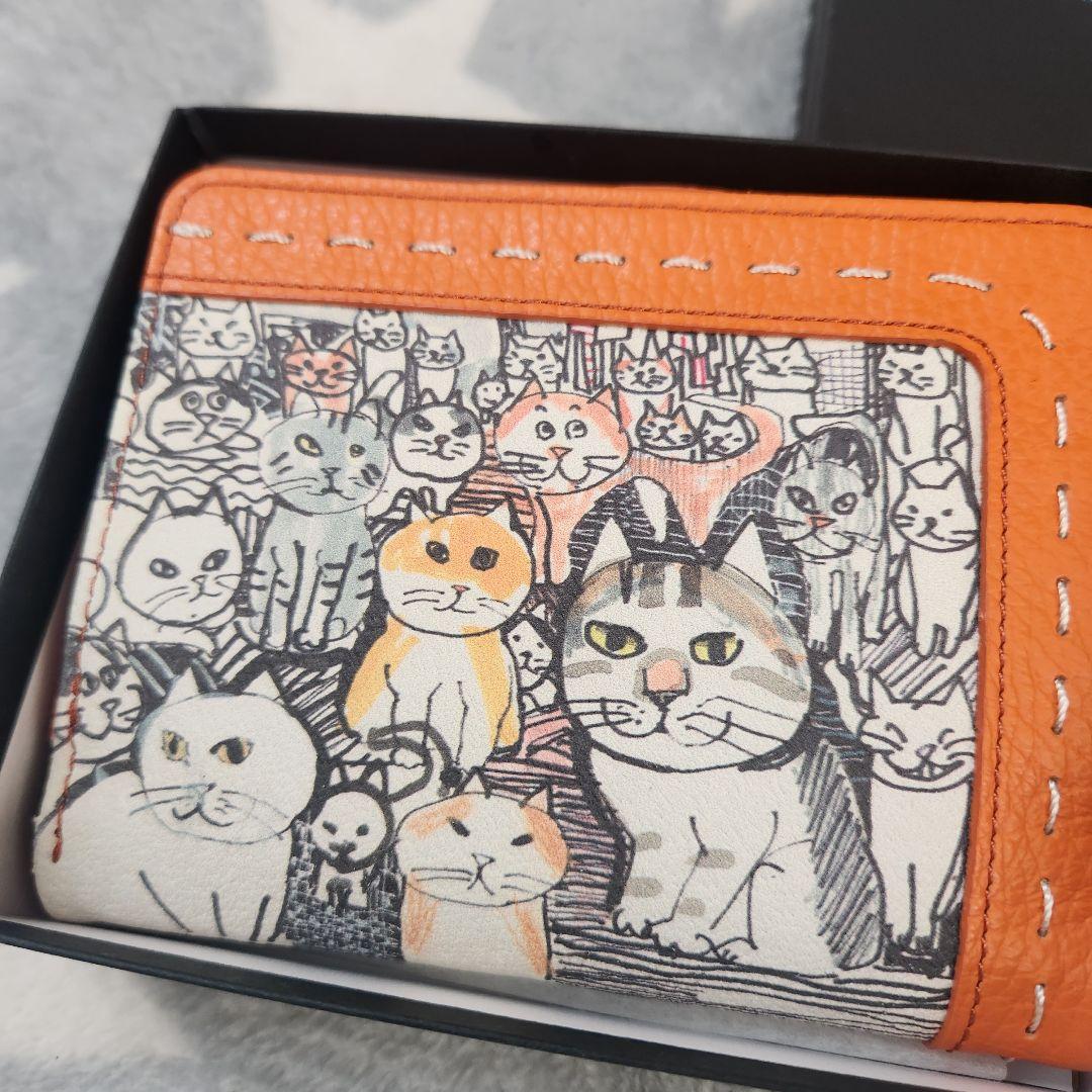 新品未使用 マンハッタナーズ 二つ折財布 猫　オレンジ