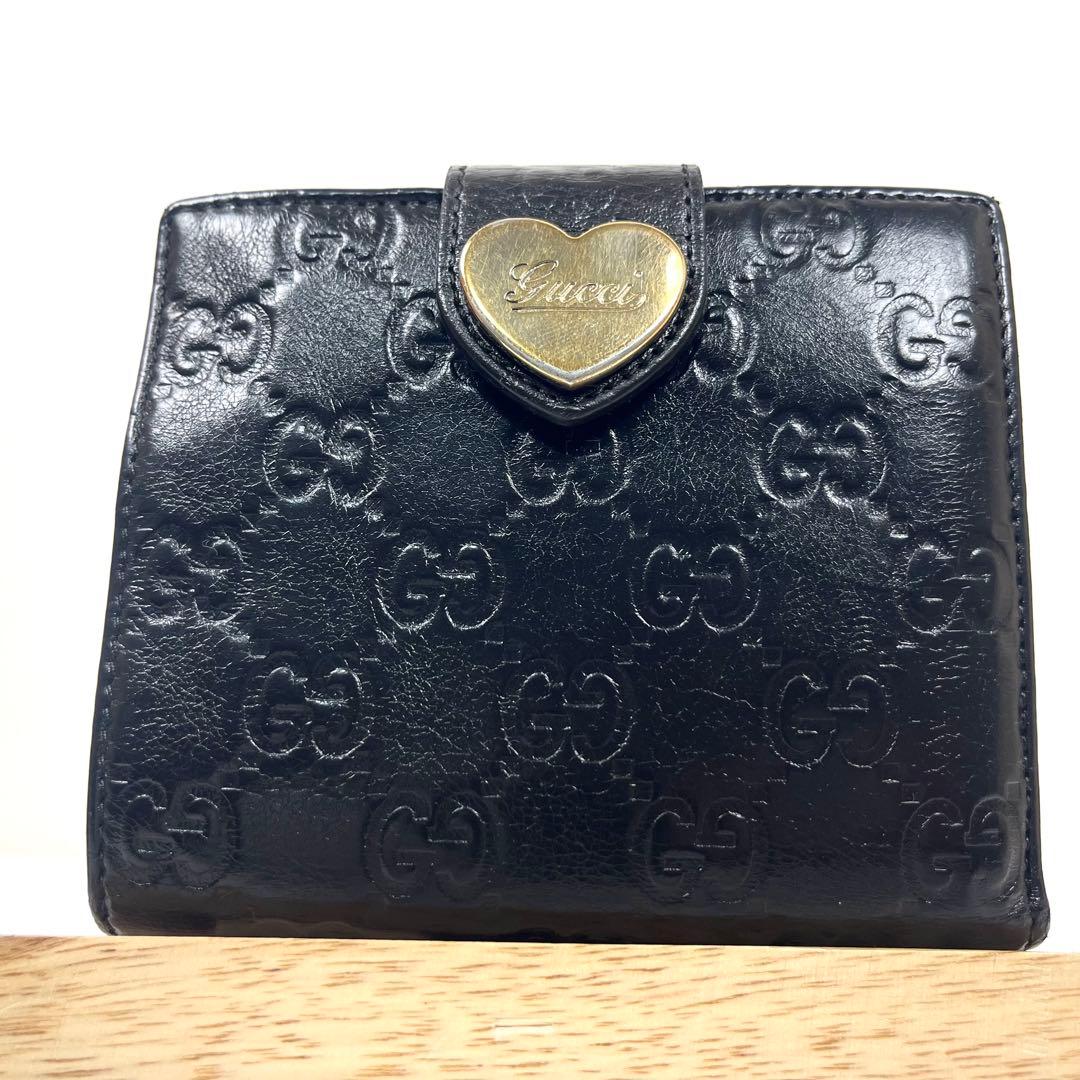 グッチ　折り財布　ハートロゴプレート　GGシマレザー　総柄エンボス　コンパクト