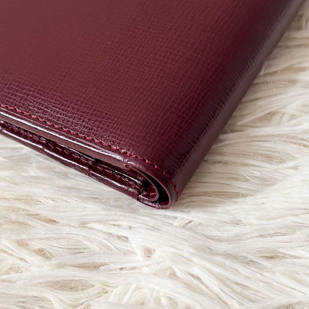 新品✨Cartierカルティエ　二つ折り財布　ボルドー　レザー　マストライン