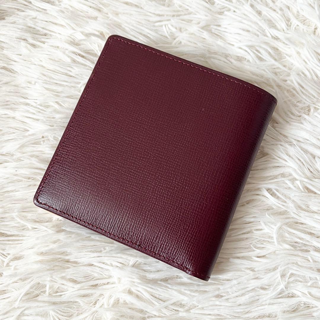 新品✨Cartierカルティエ　二つ折り財布　ボルドー　レザー　マストライン