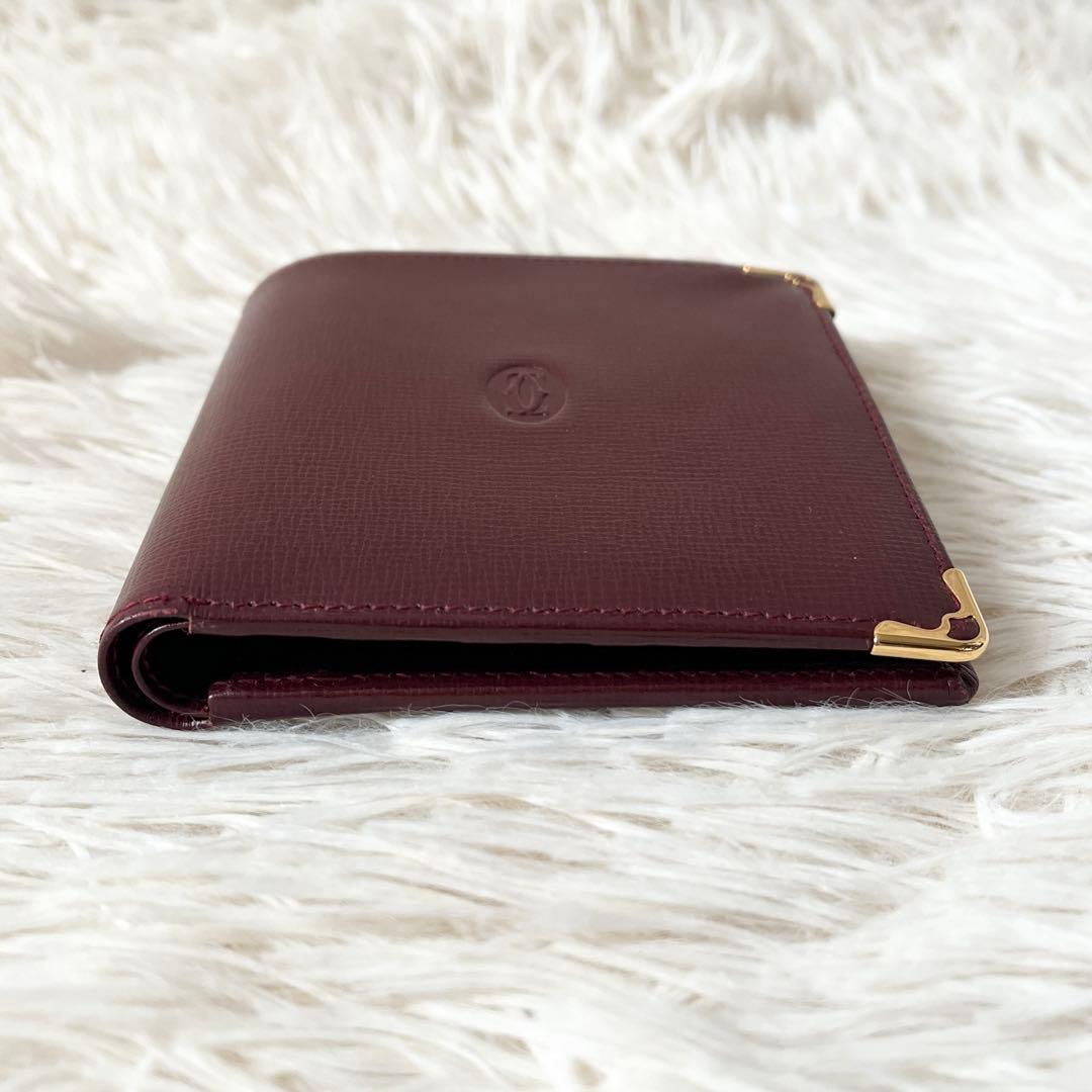 新品✨Cartierカルティエ　二つ折り財布　ボルドー　レザー　マストライン