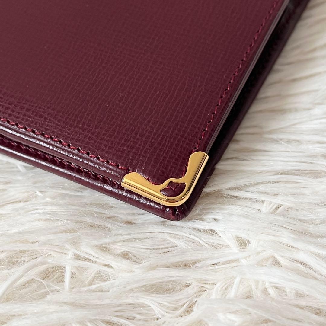 新品✨Cartierカルティエ　二つ折り財布　ボルドー　レザー　マストライン