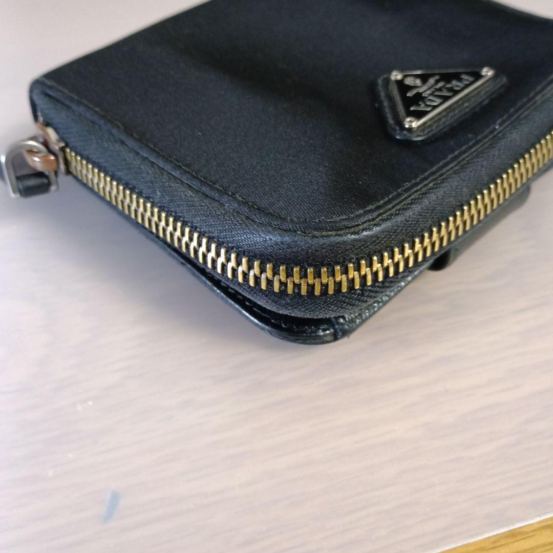 PRADA プラダ二つ折り財布ナイロン ラ ウンドジップ サフィアーノ 三角ロゴ