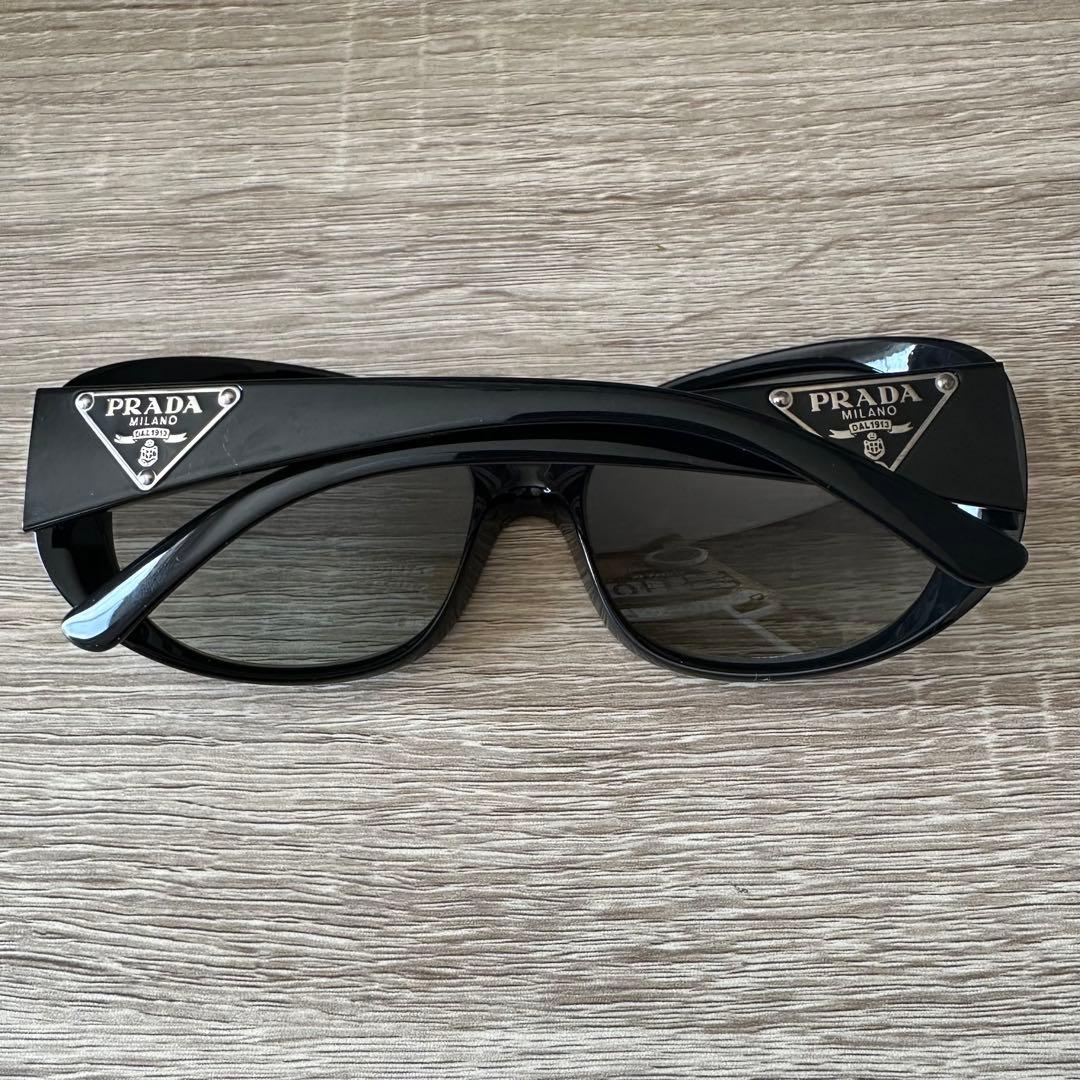 PRADA SPR 27L ブラックレディースサングラス 57◻︎17-135