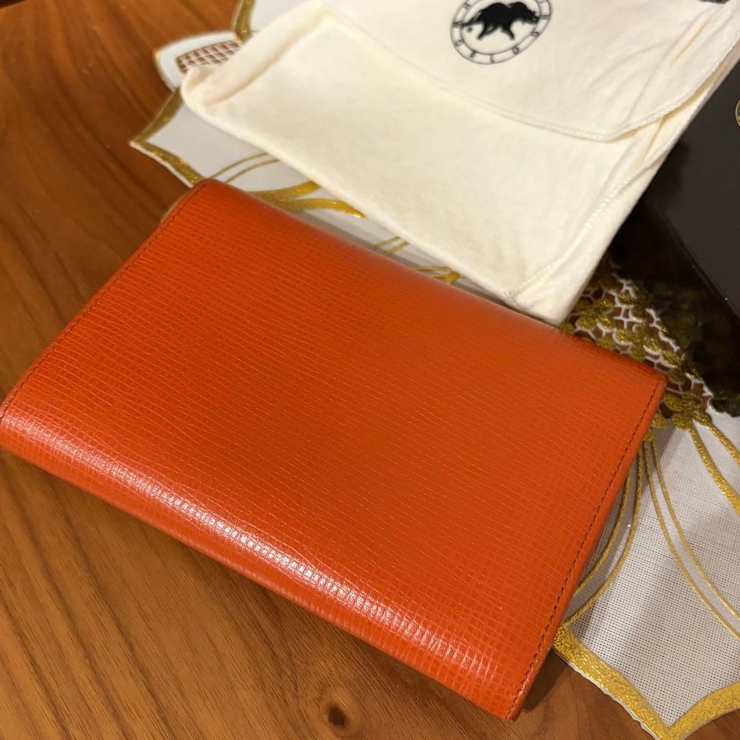ミキティラブさま　ハンティングワールド オレンジ レザー 二つ折り財布
