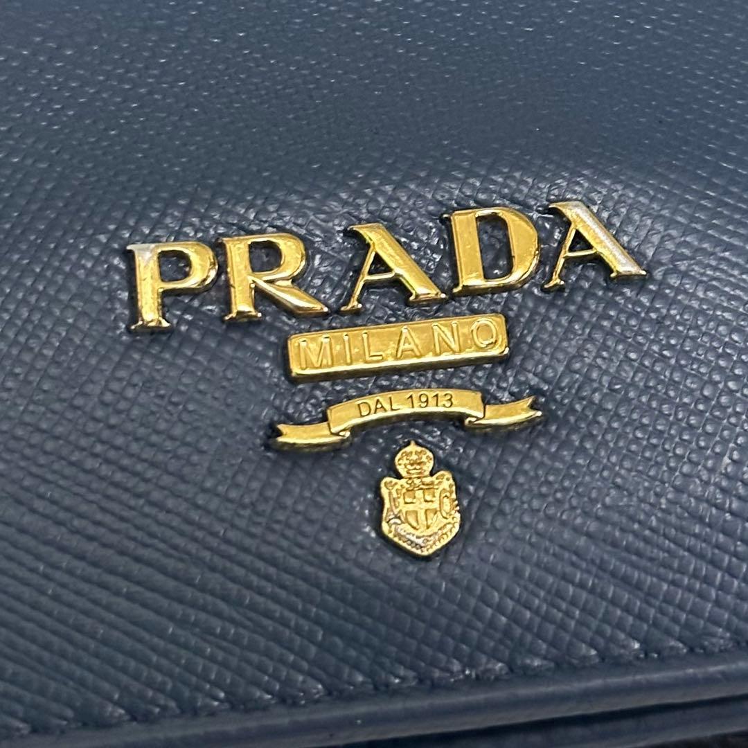 PRADA プラダ　折り財布　ゴールドロゴ ブルー　サフィアーノレザー