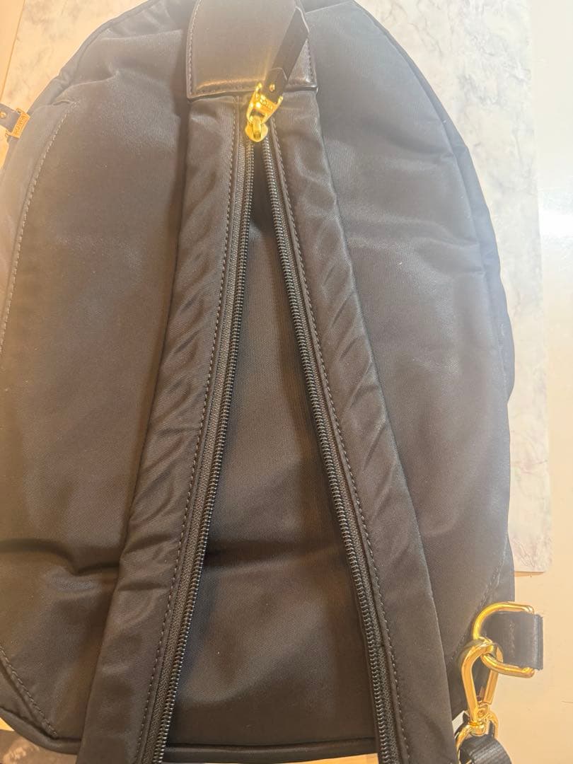TUMI トゥミ VOYAGEUR ナディア 2WAY ボディバッグ レディース