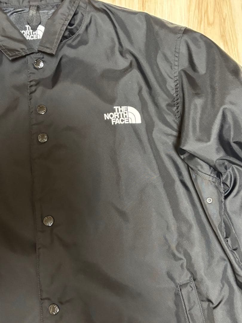 【美品】ノースフェイス コーチジャケット 黒 ワッペンロゴ NP72130