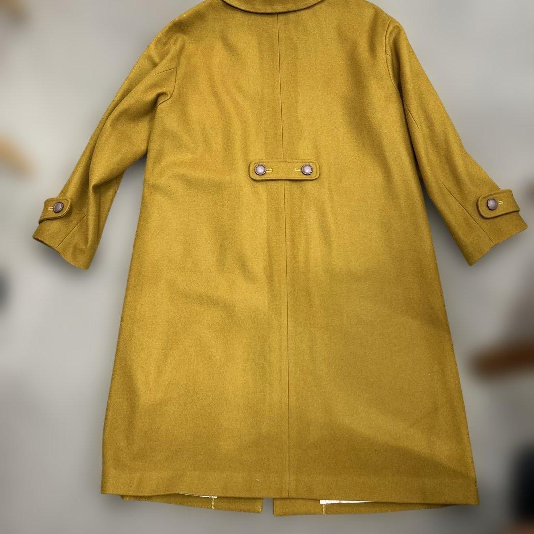 ホコモモラ　カラシ色ロングコート　サイズLぐらい