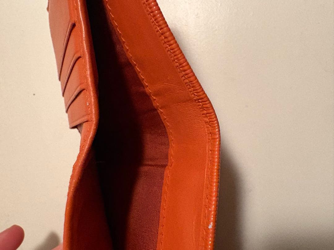 PRADA オレンジ 二つ折り財布