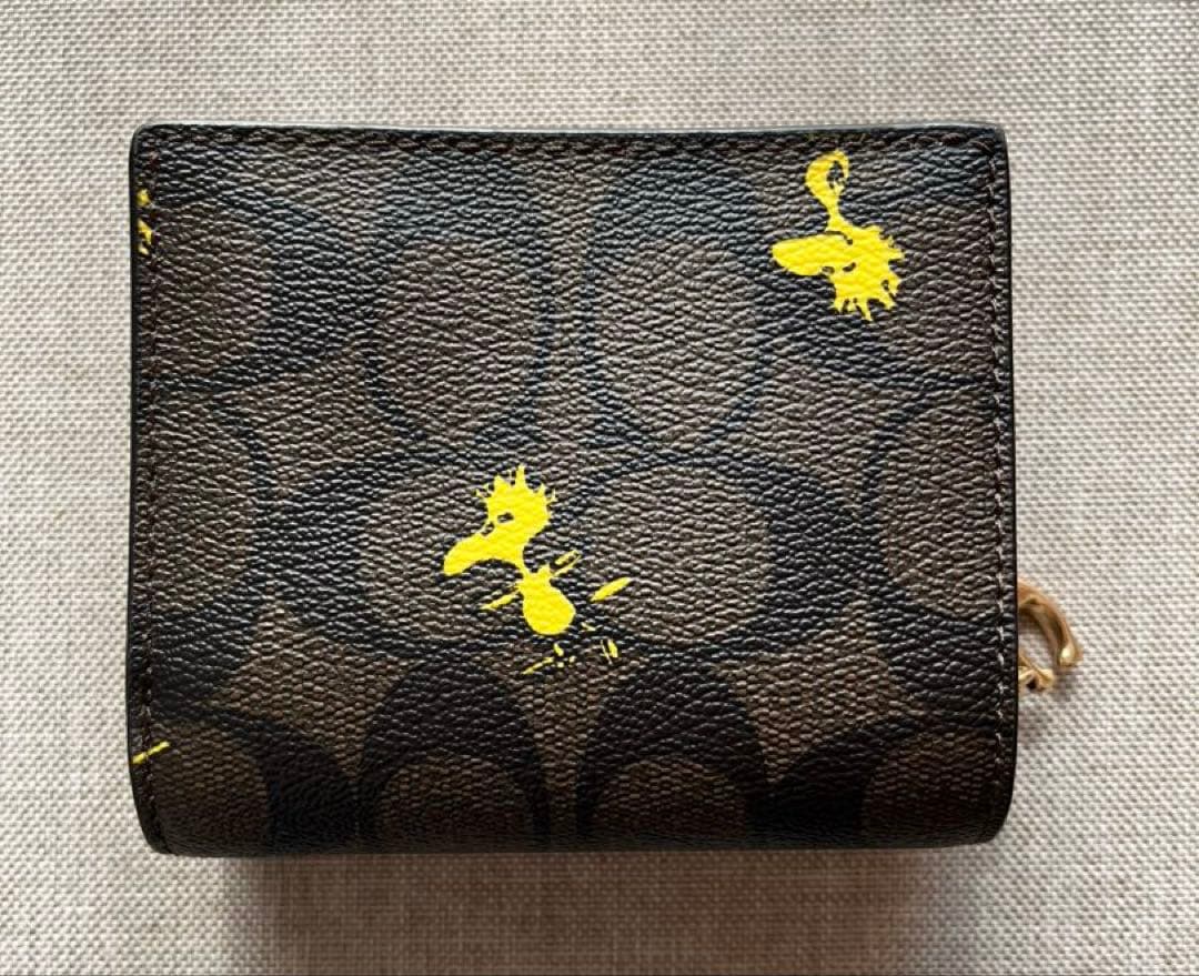 期間限定値下げ♪ COACH PEANUTS コラボ 折り財布 ウッドストック