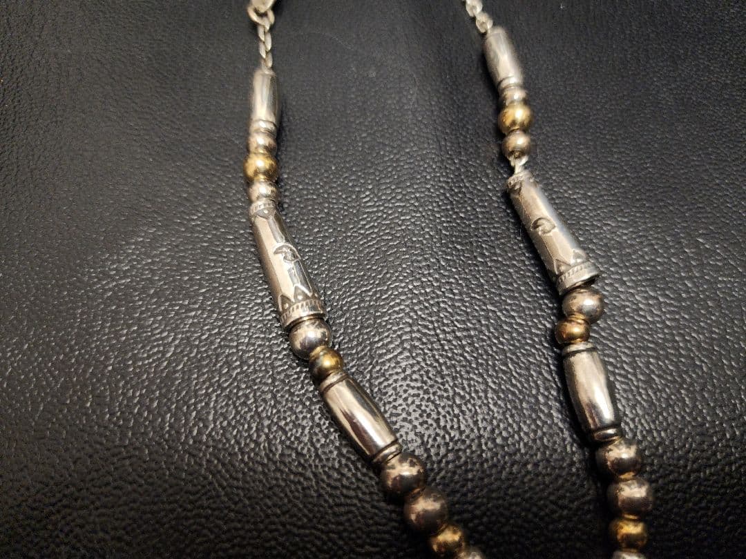 LARRY SMITH／KAZEKIRI FEATHER PENDANT
