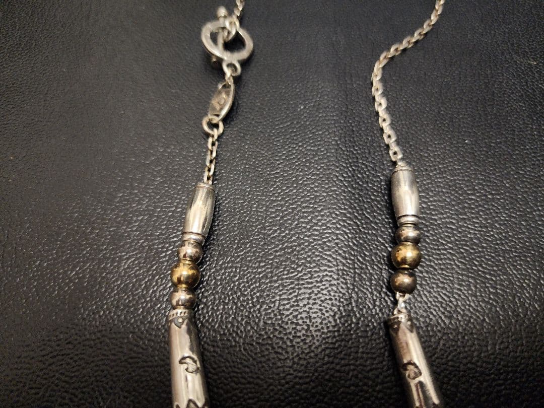 LARRY SMITH／KAZEKIRI FEATHER PENDANT