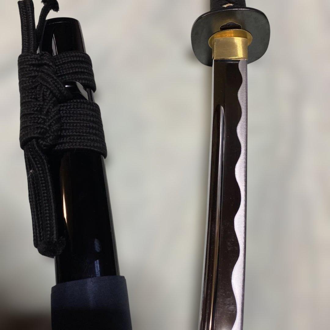高級本格派居合刀(刀袋付) 黒柄 角丸鉄鍔 黒呂鞘