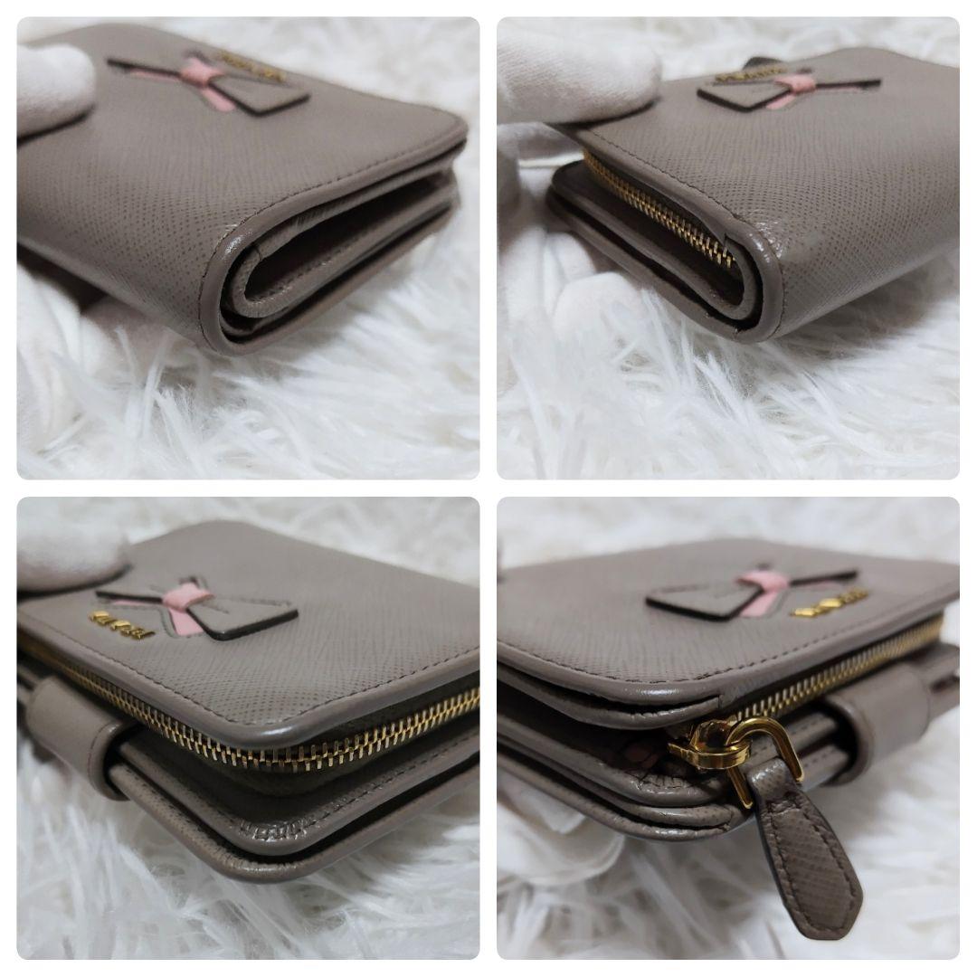 レア美品✨プラダ◇RFIDミディアムコンパクト二つ折り財布　りぼんグレーピンク