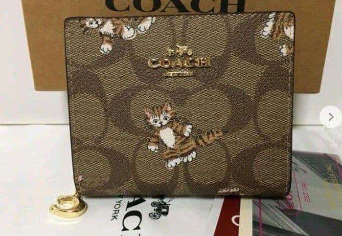新品未使用コーチ二つ折り財布キャット猫ブラウンレディースメンズ送料無料即日発送
