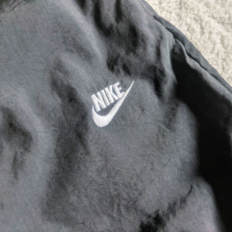 新品 NIKE ナイキ ナイロンウーブンパンツ 裏起毛