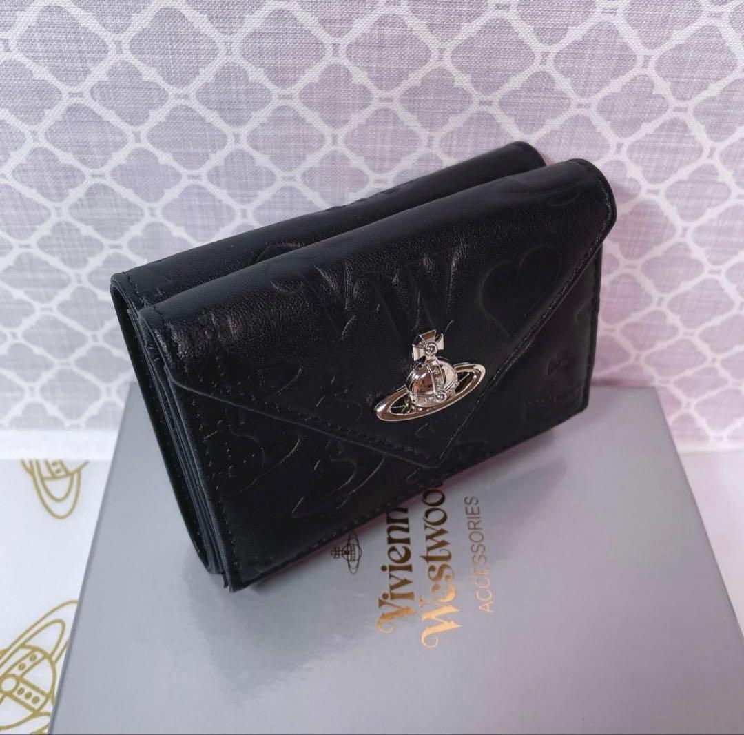 まる【内柄も素敵☆最新】Vivienne Westwood 三折財布