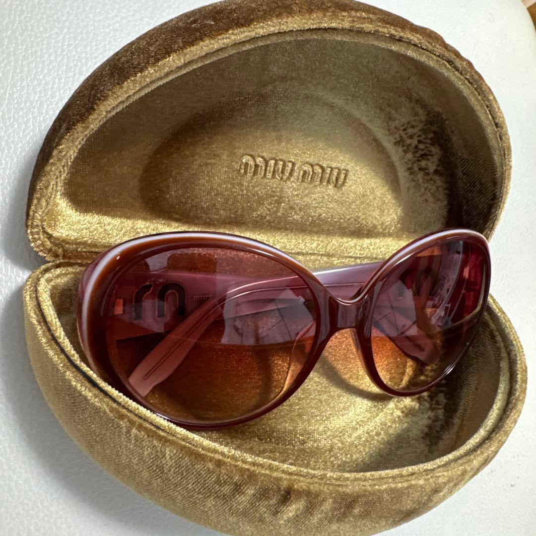 MIU MIU ラウンド型サングラス ピンク グラデーション
