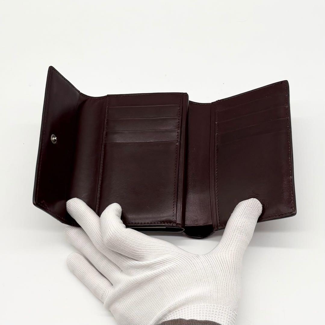 【美品】ヴィヴィアン レザー 三つ折り財布 オーブ がま口 ロゴ金具 ボルドー