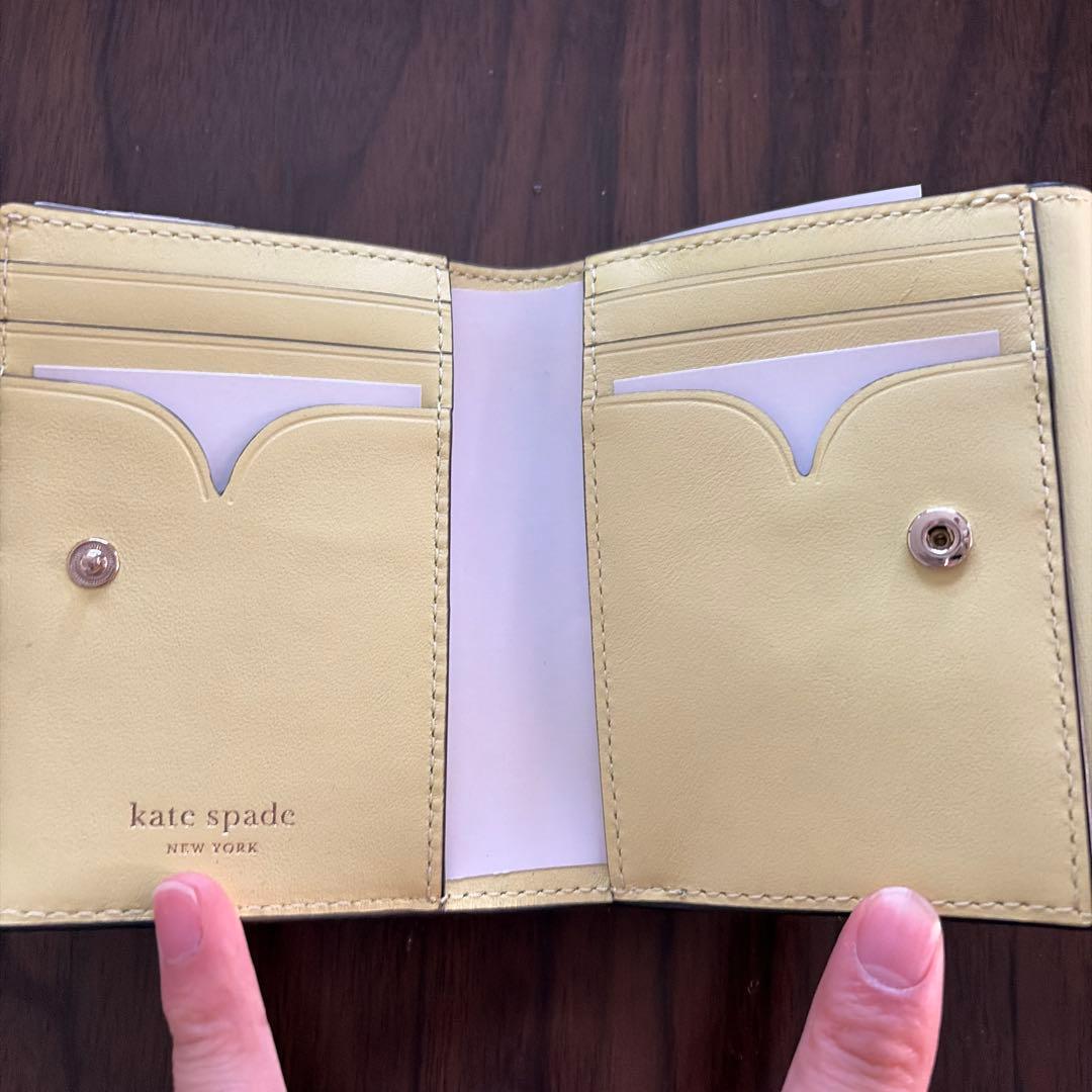 kate spade 二つ折り財布 クリーム色
