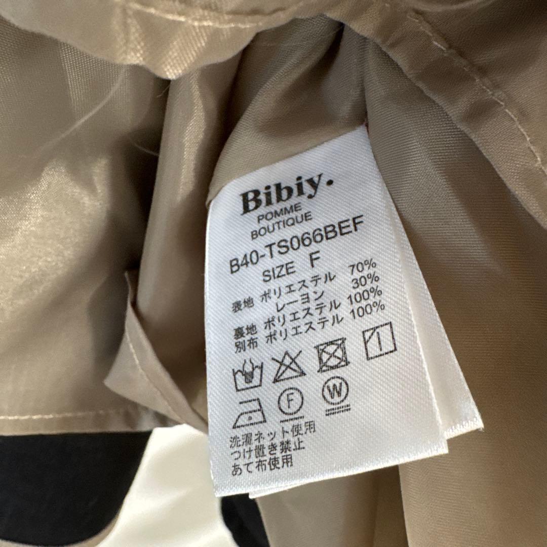 Bibiy. リボン付き ペプラムトップスベージュ