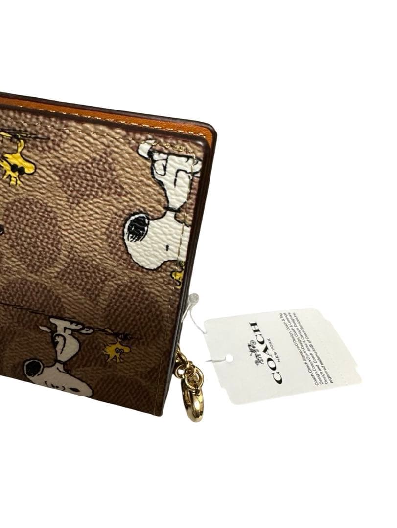 COACHコーチ スヌーピー折り財布 シグネチャー PEANUTS コラボ 美品