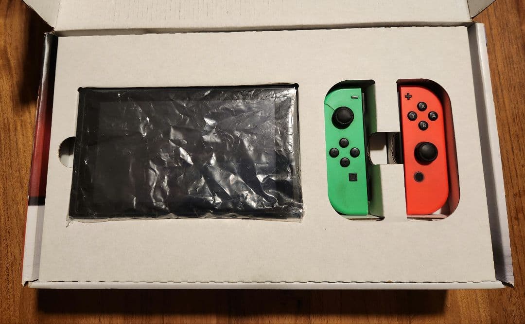 Nintendo Switch 本体 + ソフト2本 ハンドル2個 マリオカート