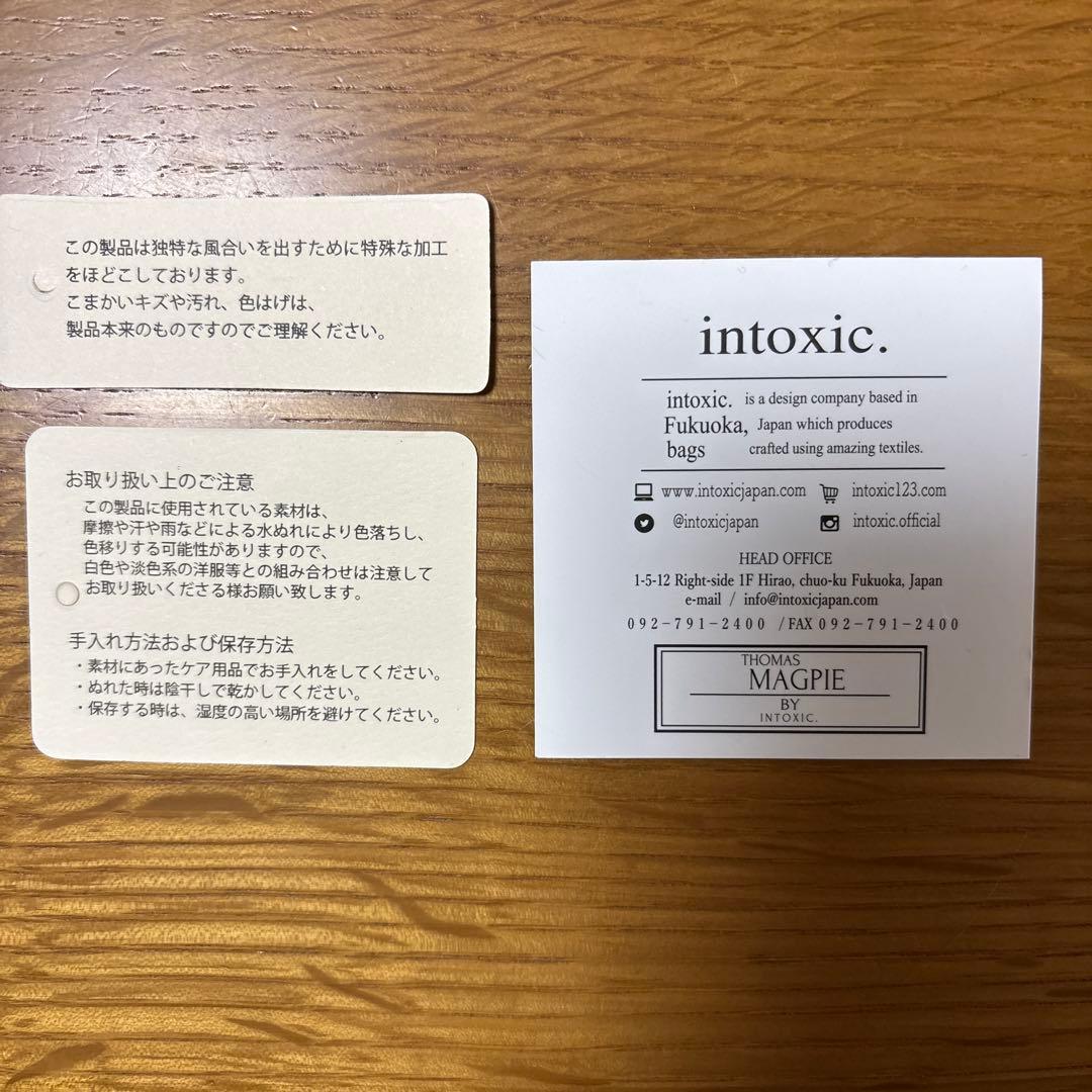 intoxic.（イントキシック） の三つ折り財布（マイクロウォレット）