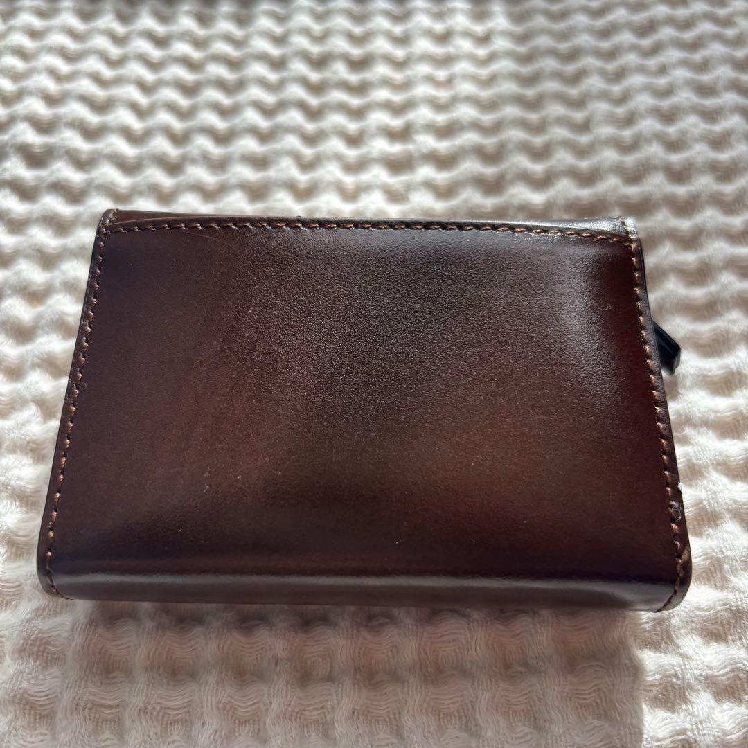 m*.様 TOUT Y ESTトゥティエ コンパクトウォレット 折り財布
