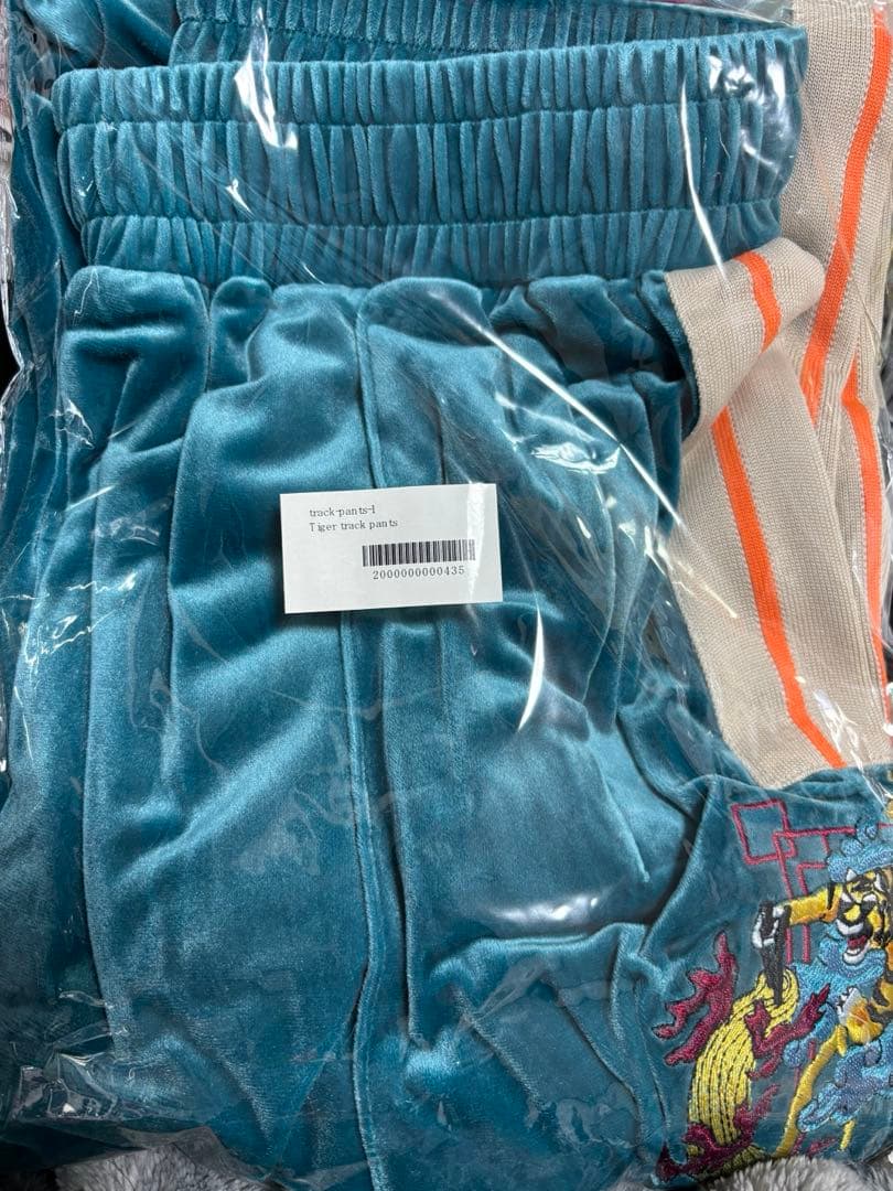 チュウカタベタイ　Tiger track pants/green Lサイズ