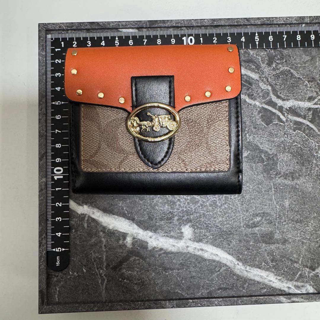 と*も様 【美品】COACHコーチ 二つ折り財布 シグネチャー柄キャンバス柄