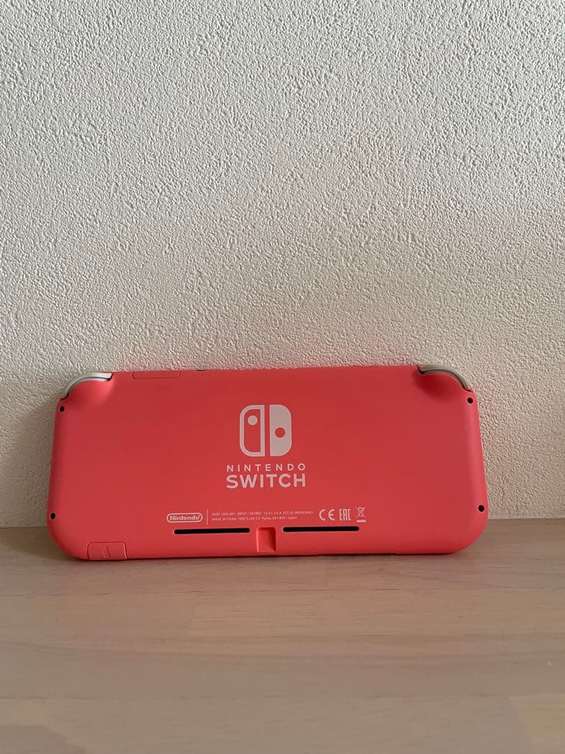 ジャンク品・Switch right 本体　コーラル （充電器、ケースつき）