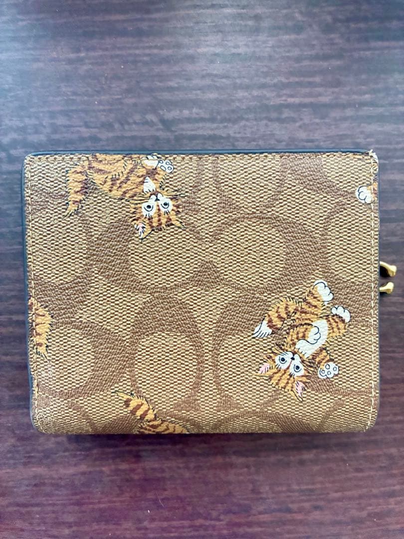 ヤ*カ様 COACH 猫プリント 二つ折り財布