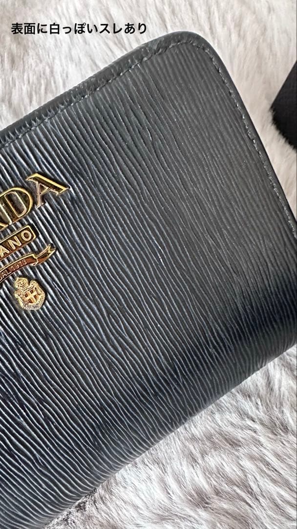 PRADA 二つ折り財布 サフィアーノレザー　黒