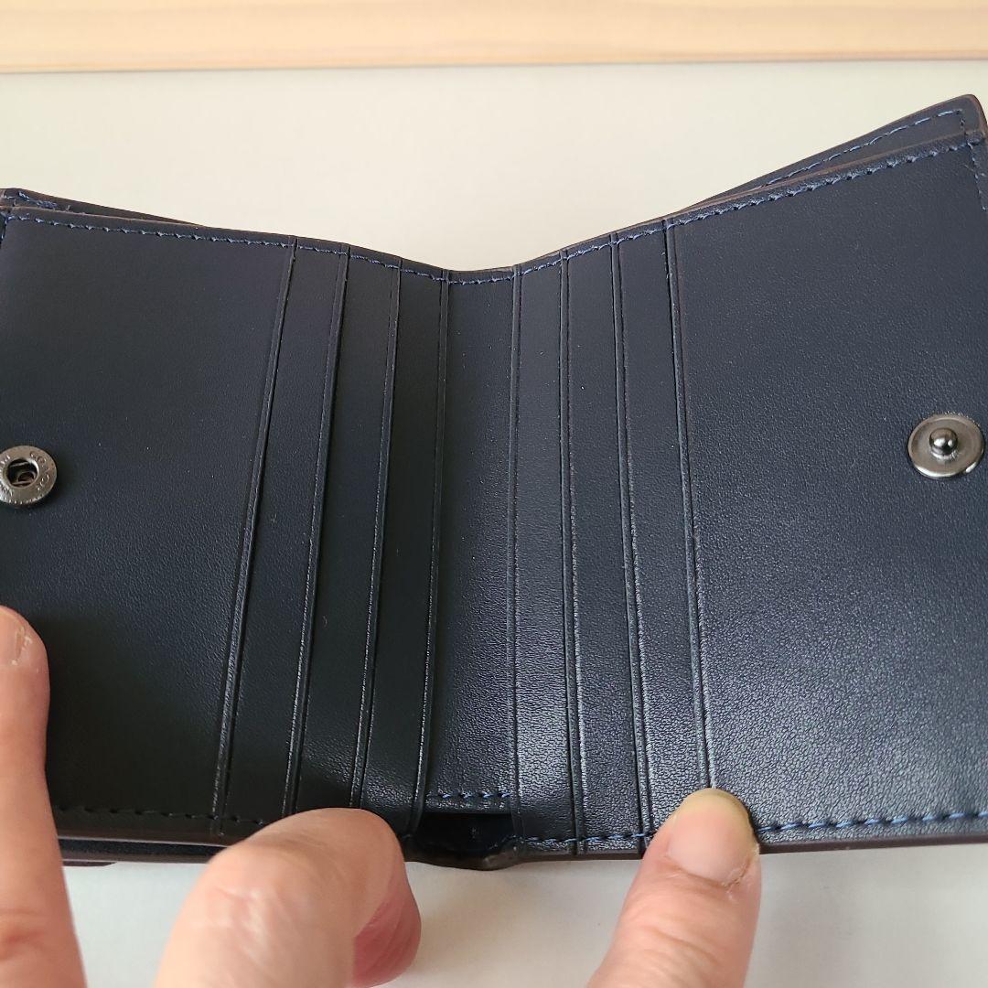 コーチ☆スムースカーフレザー☆シグネチャー型押し☆二つ折りウォレット