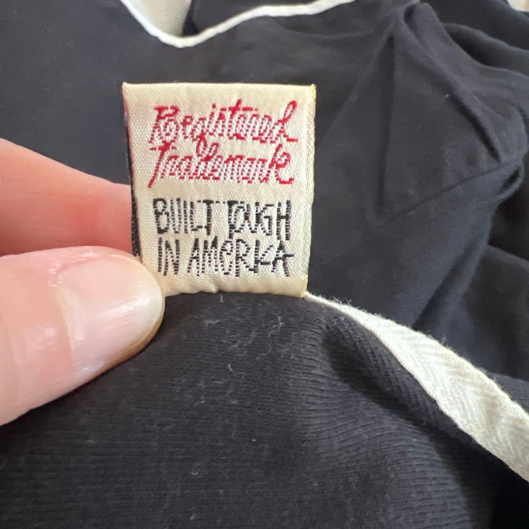 OLD StussyヘンリーネックのブラックTシャツ