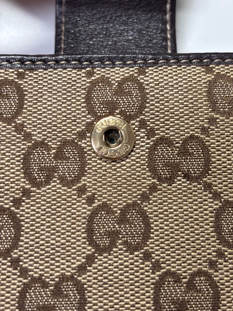 GUCCI 二つ折り財布　キャンバス　GG柄