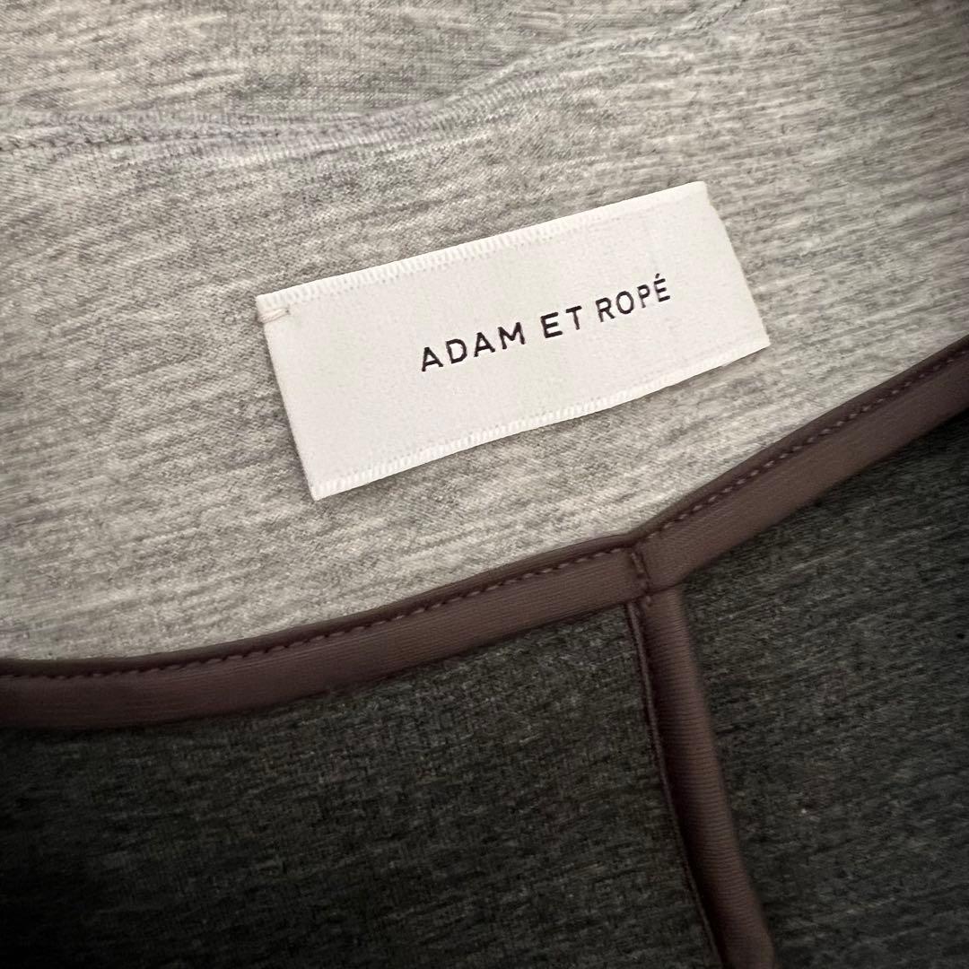 ADAM ET ROPÉ 【洗える】エッグブローチ付きペプラムカーディガン