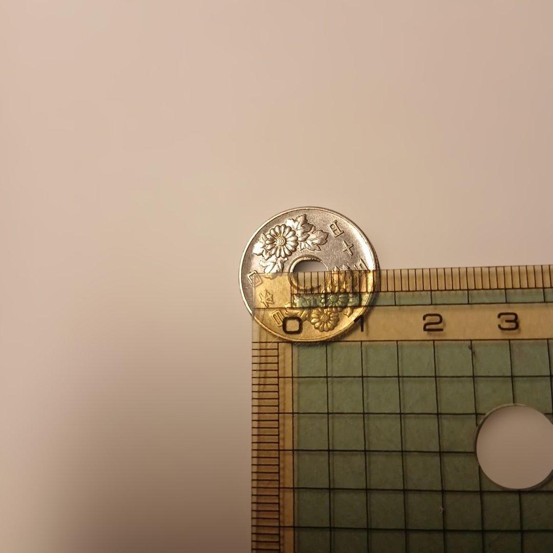 50円玉エラー　穴ズレ