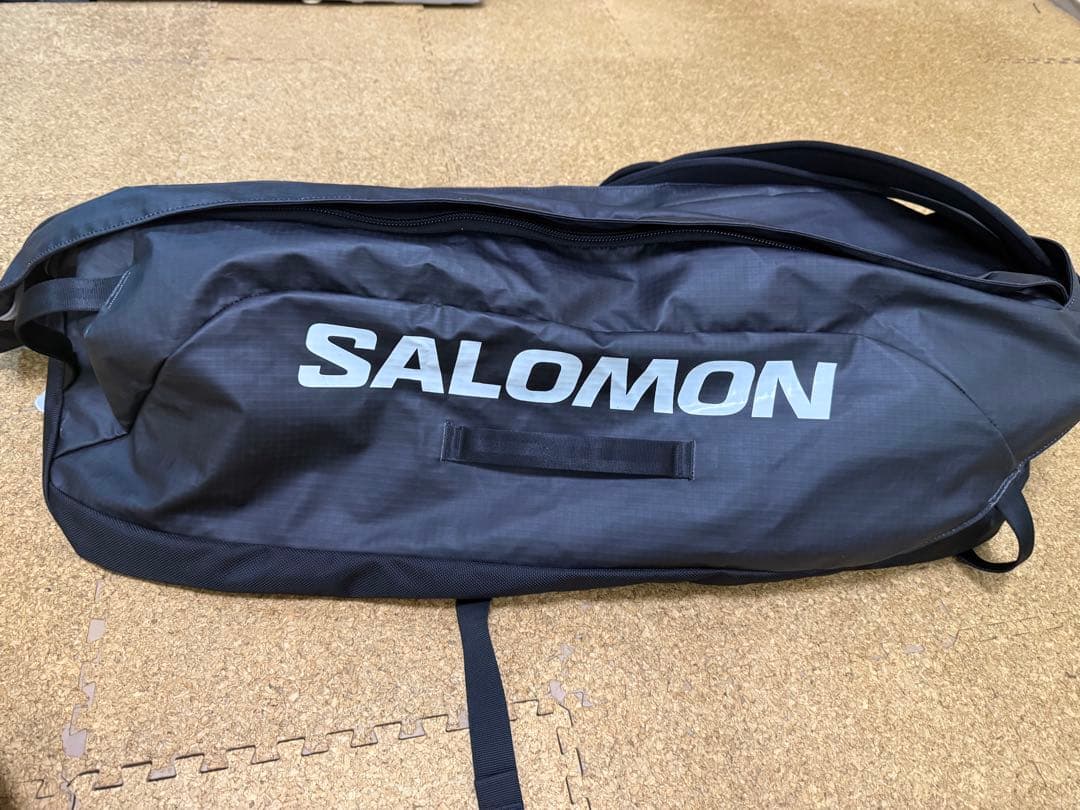 美品サロモンOUTLIFE DUFFEL 70 黒ダッフルバッグ　リュック